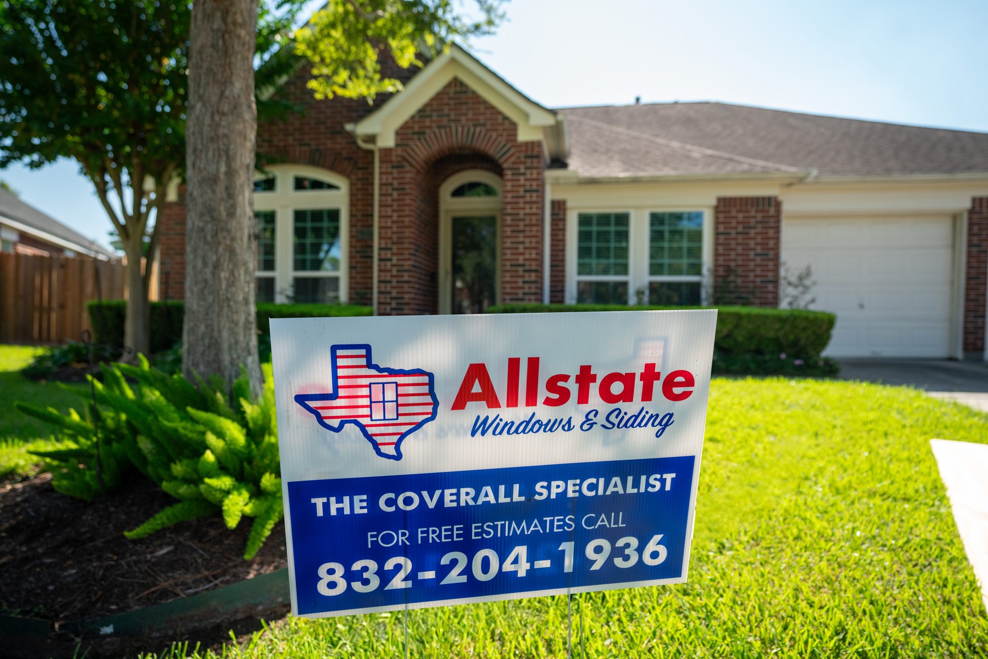 Allstate Windows & Siding yard sign at a Houston job