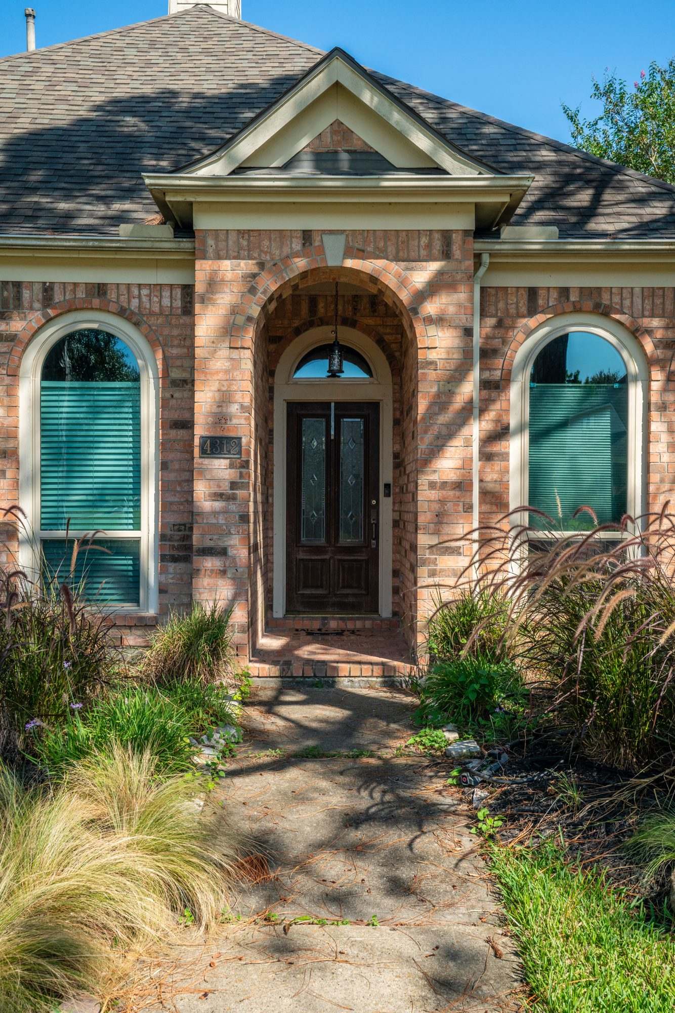 Allstate Windows & Siding project — door entry arched portico